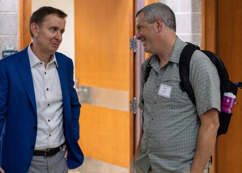 Speaker Peter Felten with faculty member after keynote